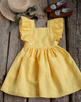 Yellow Linen Cross Back Pinafore with Wings