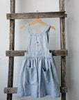 Baby Blue Cross Back Linen Pinafore, Flying pig (blue) embroidery, Size 5-6 years (STOCK)