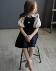 Black Cross Back Linen Pinafore, 5-6 years, Arctic Fox Embroidery