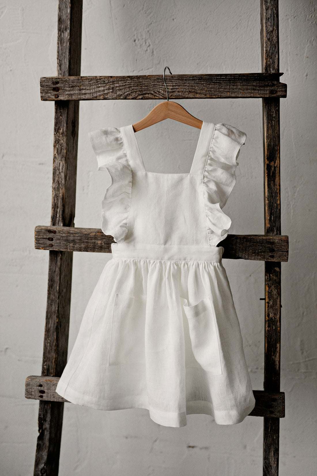 White Cross Back Pinafore with Wings
